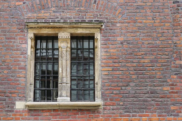 Medieval brick wall with large window — Stock Photo, Image