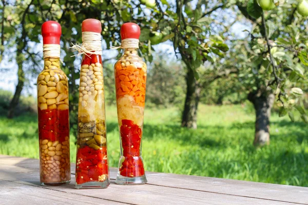 Colorful pickled vegetables in preserving glass — Stock Photo, Image