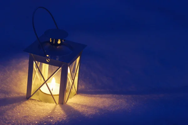 Beautiful lanterns on snow — Stock Photo, Image