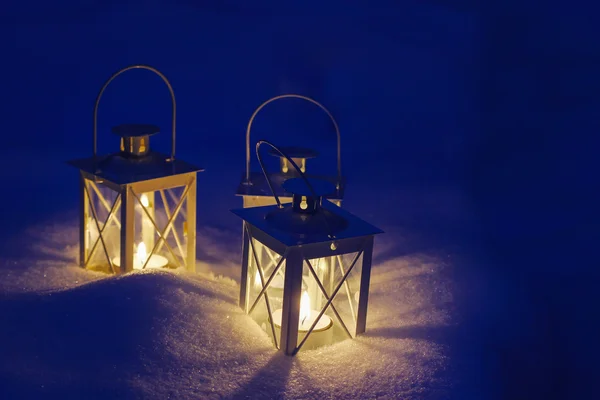 Beautiful lanterns on snow — Stock Photo, Image