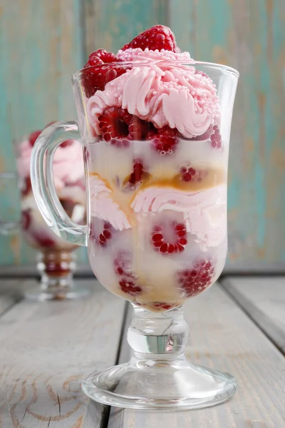 Raspberry layer dessert on wooden background, copy space — Stock Photo, Image