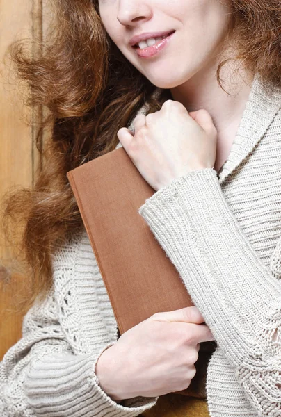 Woman holding old book — Stock Photo, Image