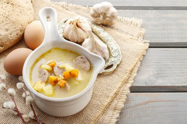 Portion of the sour rye soup made of soured rye flour and meat — Stock Photo, Image