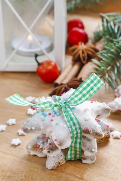 Christmas cookies in star shape on wooden table — Stock Photo, Image