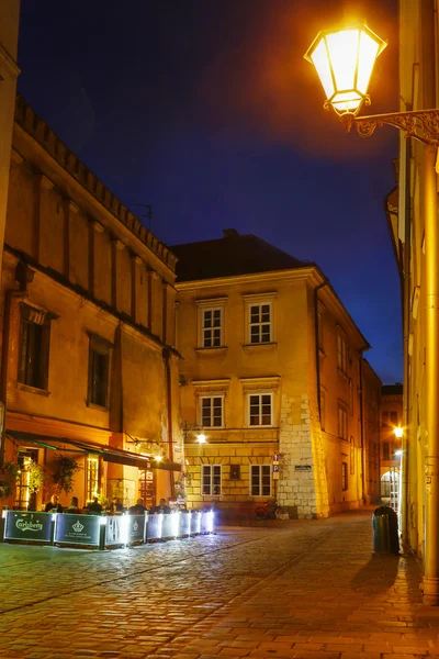 Centro de la ciudad de noche: temements antiguos Cracovia, Polonia — Foto de Stock
