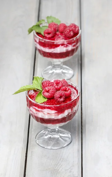 Layer raspberry dessert on garden party table. — Stock Photo, Image