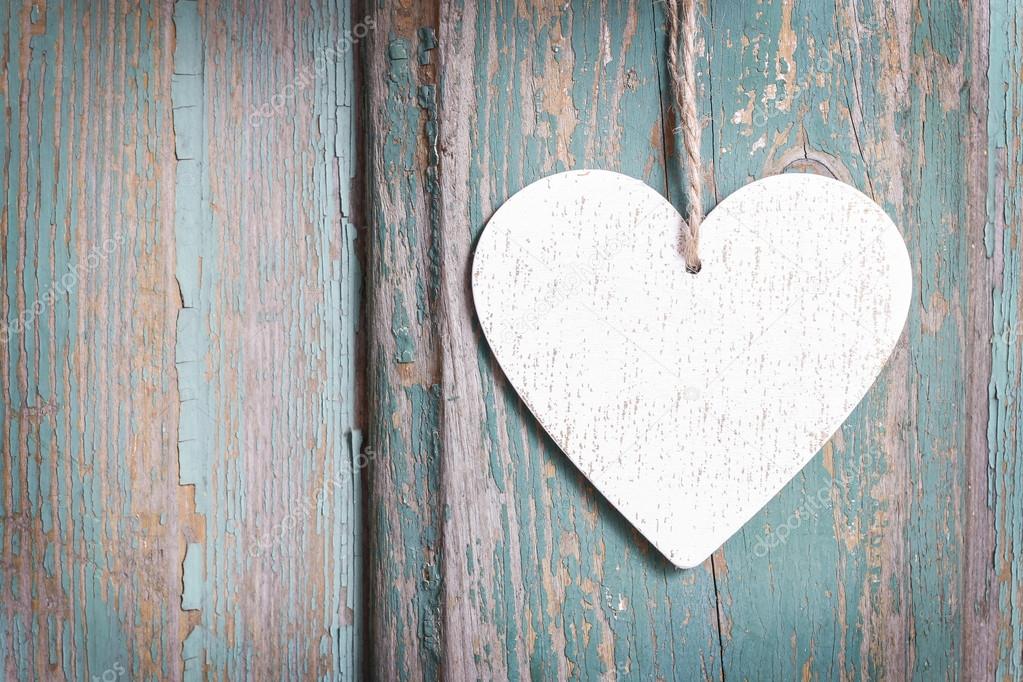 Heart on wooden background