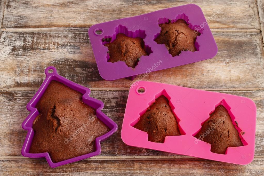 Chocolate cookies in silicone molds — Stock Photo © agneskantaruk 61102263