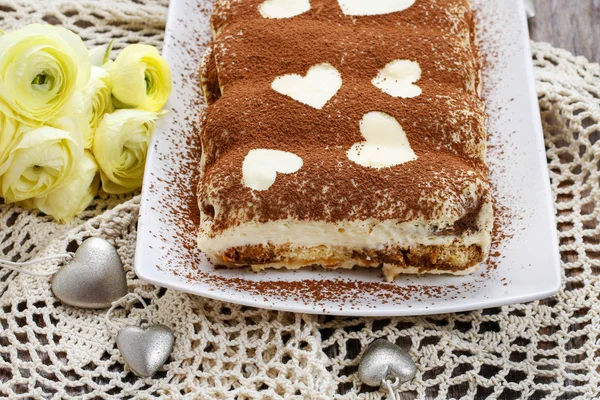 Tiramisu cake decorated with hearts — Stock Photo, Image
