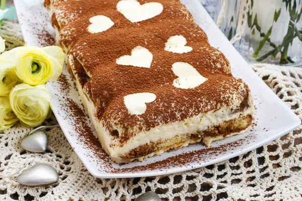 Tiramisu cake decorated with hearts — Stock Photo, Image