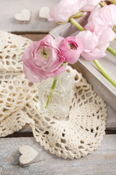 Pink persian buttercup flowers (ranunculus) in crystal vase — Stock Photo, Image