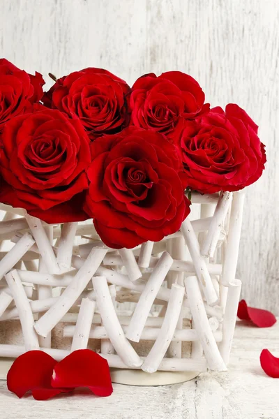 Red roses on white wooden background — Stock Photo, Image