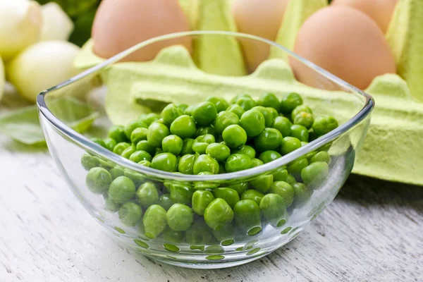 Bowl of green peas — Stock Photo, Image