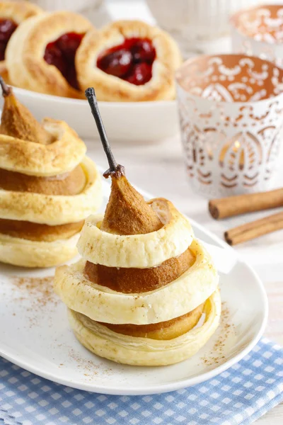 Pear with cinnamon in pastry — Stock Photo, Image