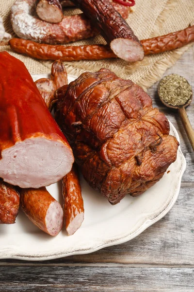 Smoked ham and sausage — Stock Photo, Image