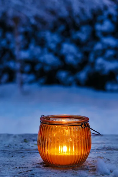 Orange lantern in winter garden — Stock Photo, Image