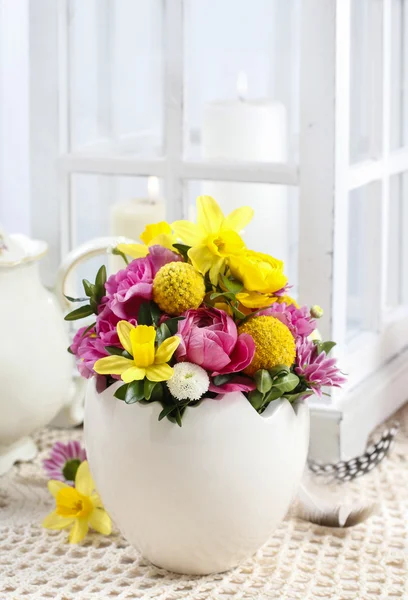 Easter floral arrangement in white egg shell — Stock Photo, Image