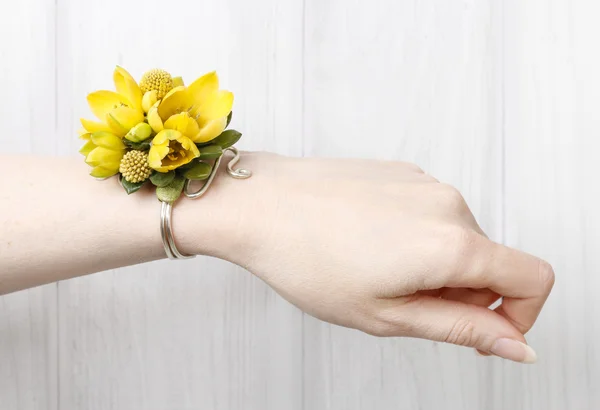 Wrist corsage made of yellow flowers — Stock Photo, Image