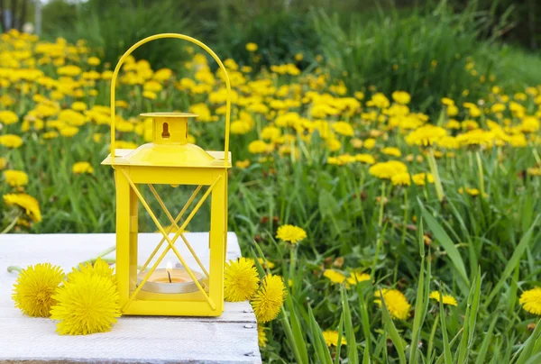 Lantern on wooden table at summer party. — Stock Photo, Image