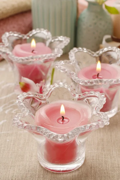 Pink scented candles in glass candle holders — Stock Photo, Image