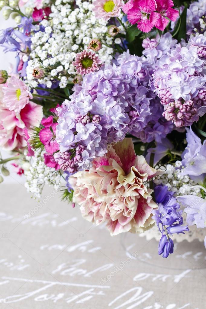 Bouquet of carnations, lilacs and chrysanthemums