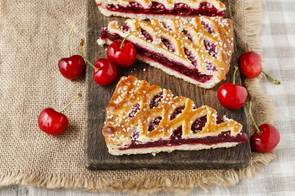 Puff pastry cookies filled with cherries — Stock Photo, Image