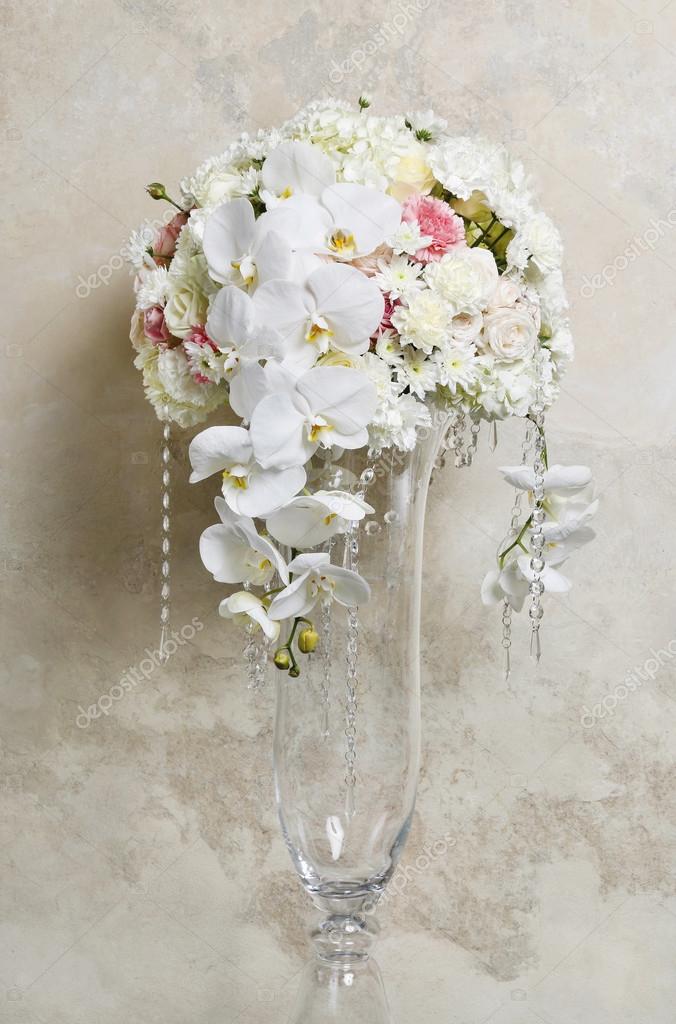 Floral arrangement with white orchids Stock Photo by ©agneskantaruk