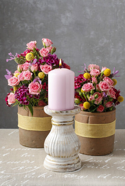 Romantic floral arrangement with roses and carnations