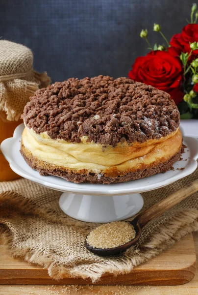 Cheesecake with chocolate topping — Stock Photo, Image