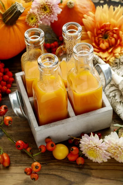 Bottles with orange juice — Stock Photo, Image