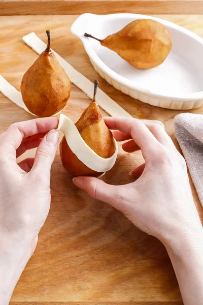 Steps of making pear in pastry - delicious dessert. — Stock Photo, Image