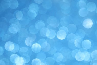 Mavi ışıklar bulanık. Işıltılı arka plan