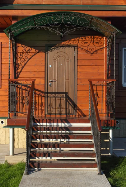 Front steps with wrought-iron fence closeup — Stock Photo, Image