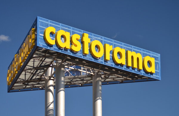 sign of Castorama against blue sky