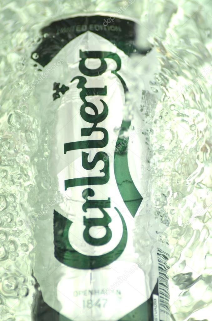 Carlsberg beer in splashed water