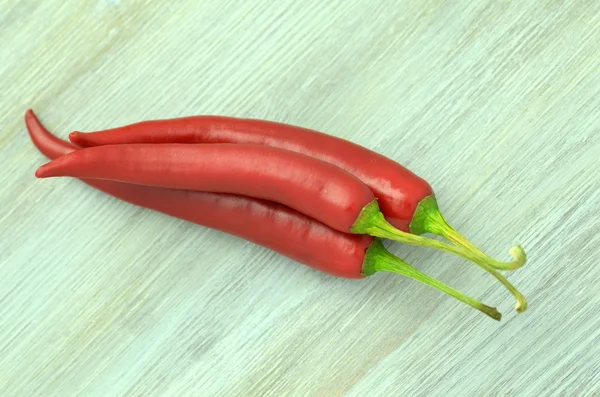 Red hot chili peppers på bord — Stockfoto