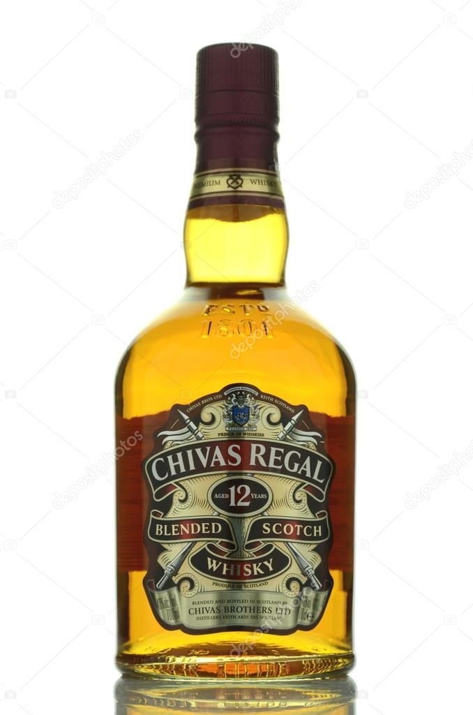 Kwidzyn, Poland - April 11, 2015: Chivas Regal whisky isolated on white background. Chivas Regal is blended scotch whisky produced by Chivas Brothers, owned by Pernod Ricard.