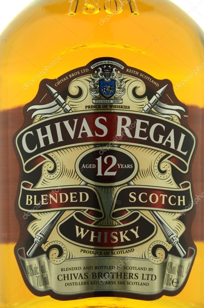 Kwidzyn, Poland - April 9, 2015: Chivas Regal whisky isolated on white background. Chivas Regal is blended scotch whisky produced by Chivas Brothers, owned by Pernod Ricard.