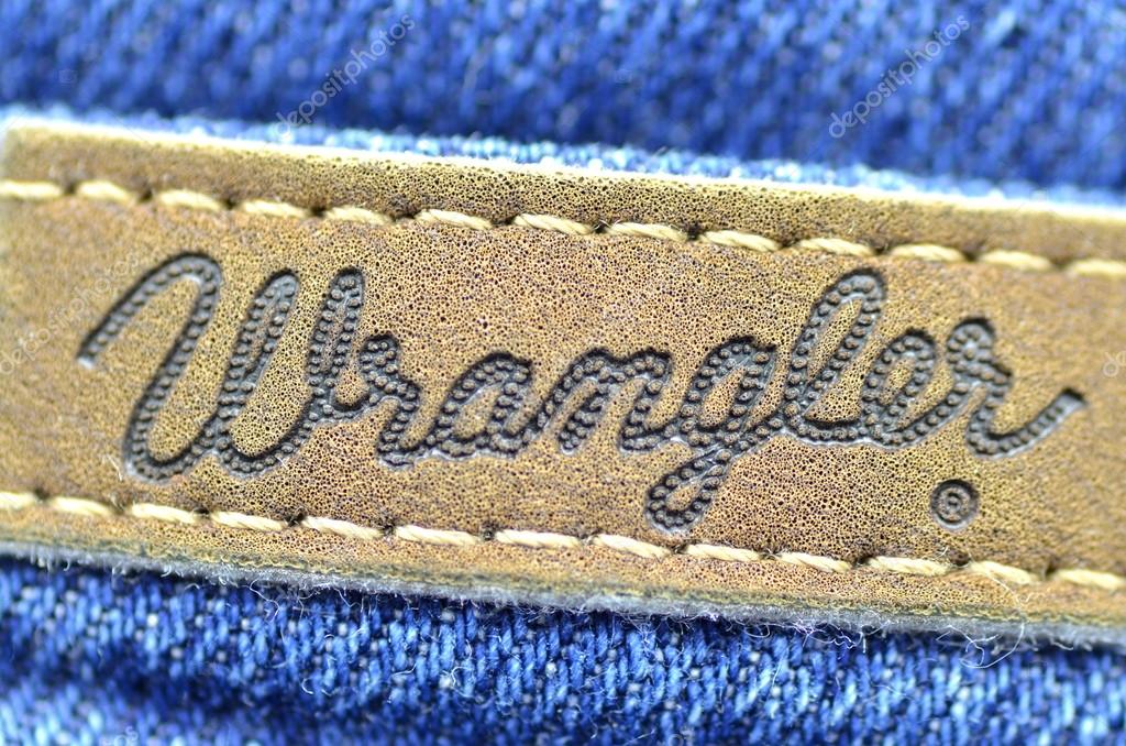 Closeup of Wrangler  label  on blue jeans Stock Editorial 