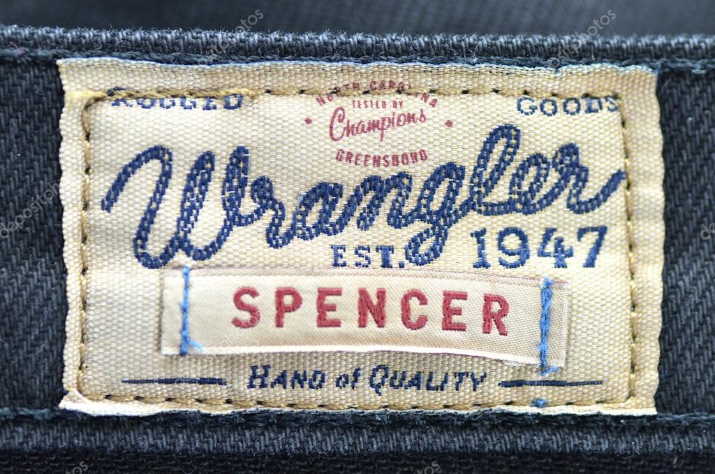Circa June 2014 - Kwidzyn: Closeup of Wrangler label on blue jeans. Wrangler is American manufacturer of jeans. Its headquarters is in Greensboro, North Carolina, USA.