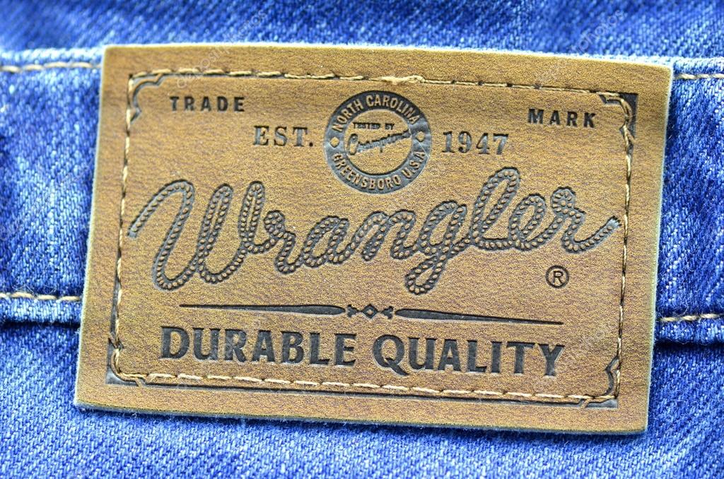 Closeup of Wrangler  label  on blue jeans Stock Editorial 
