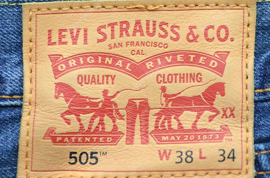 CIRCA JUNE 2014 - KWIDZYN: Closeup of Levi Strauss label on blue jeans. Levi Strauss & Co. is American clothing company known worldwide for its Levis brand of denim jeans. It was founded in 1853.