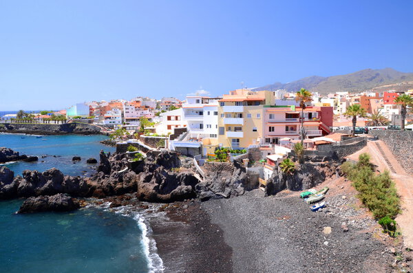 Picturesque beach and volcanic rocks in Alcala on Tenerife, Spain