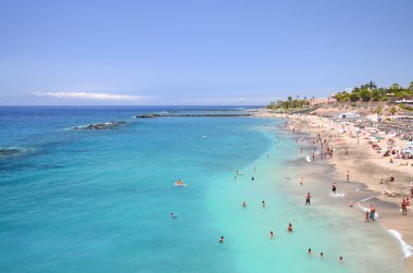 Gorgeous azure sandy Playa del Duque in Costa Adeje on Tenerife, Spain