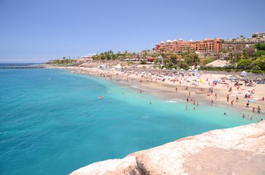Gorgeous azure sandy Playa del Duque in Costa Adeje on Tenerife, Spain
