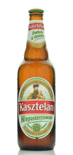 Kasztelan unpasteurized  lager beer isolated on white background — Zdjęcie stockowe