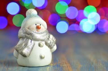 Noel dekorasyonu, bokeh arka plan kardan adam figürü