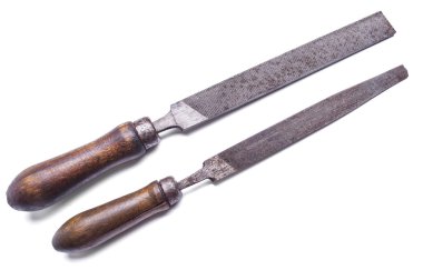 Beyaz arka plan üzerinde izole retro paslı törpülemek dosya