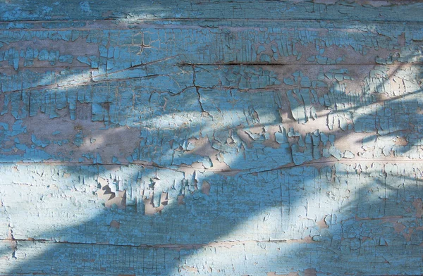 Rustic wood texture with fading blue paint — Stock Photo, Image