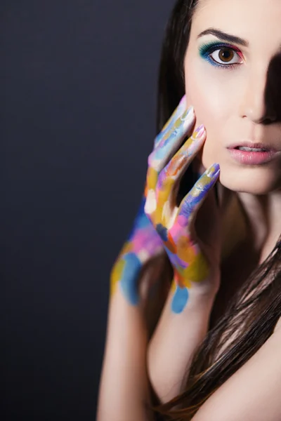 Girl in colorful paints — Stock Photo, Image